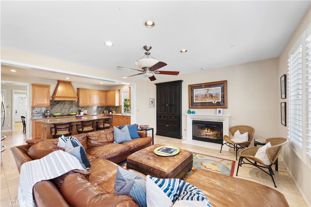 15 Corte Limonada San Clemente, CA 92673 - Photo 27 of 64 a living room with furniture fireplace and a table