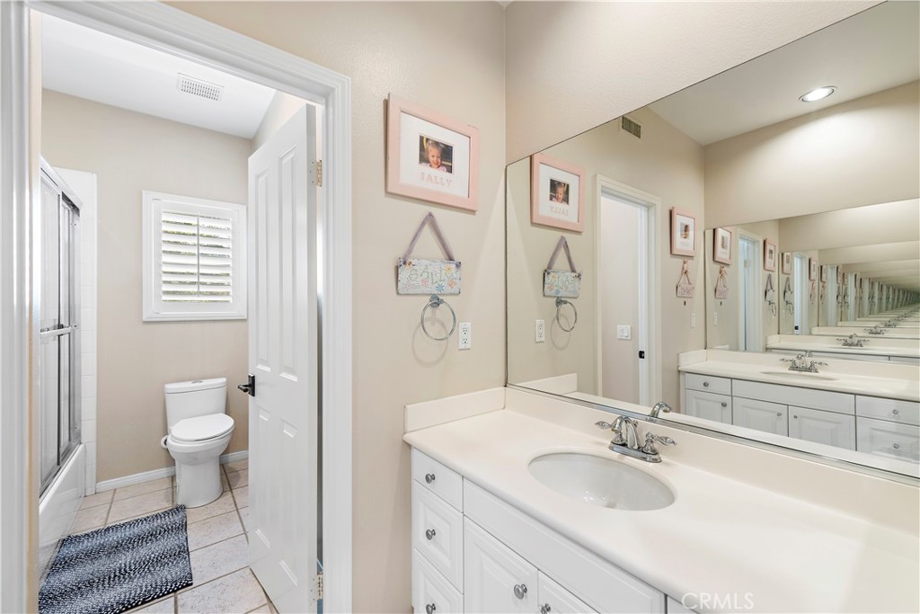 15 Corte Limonada San Clemente, CA 92673 - Photo 44 of 64 a bathroom with a granite countertop sink toilet and shower