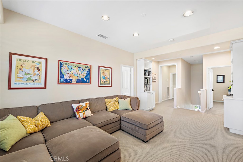 15 Corte Limonada San Clemente, CA 92673 - Photo 48 of 64 a living room with furniture and a couch