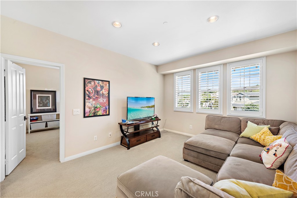 15 Corte Limonada San Clemente, CA 92673 - Photo 49 of 64 a living room with furniture window and a flat screen tv