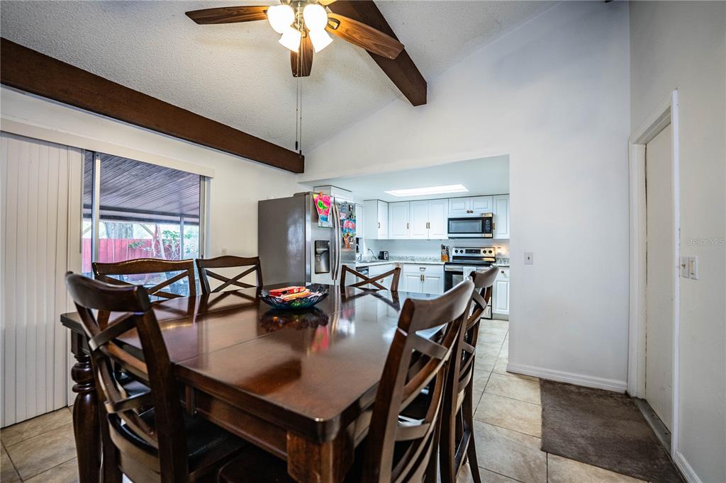 207 24th Court Southwest Winter Haven, FL 33880 - Photo 23 of 75 a dining room with furniture and window