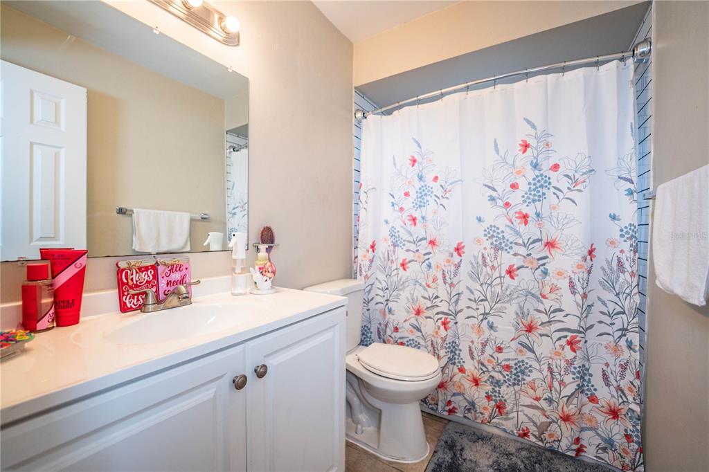 207 24th Court Southwest Winter Haven, FL 33880 - Photo 36 of 75 a bathroom with a sink and a toilet