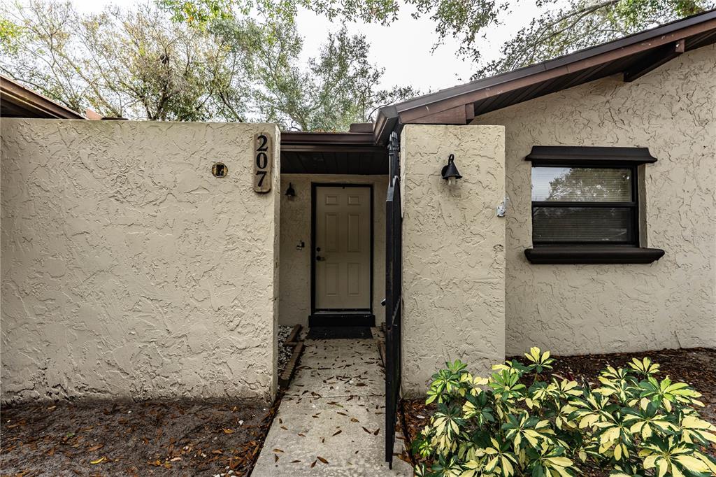 207 24th Court Southwest Winter Haven, FL 33880 - Photo 5 of 75 a bathroom with a shower and a mirror