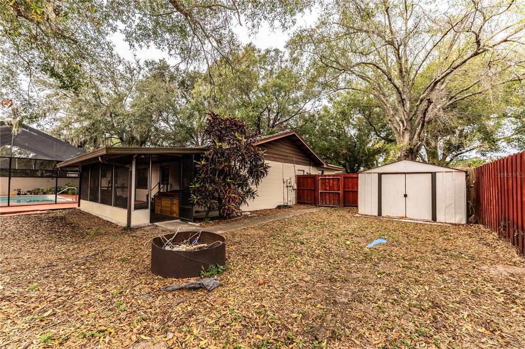 207 24th Court Southwest Winter Haven, FL 33880 - Photo 59 of 75 a view of a house with a yard
