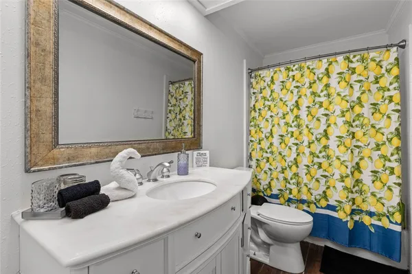 a bathroom with a sink and a toilet