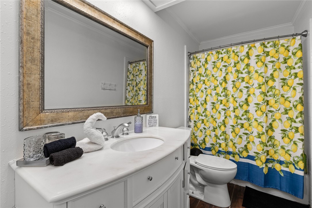 2275 West Moonlight Drive Robinson, TX 76706 - Photo 17 of 40 a bathroom with a sink and a toilet