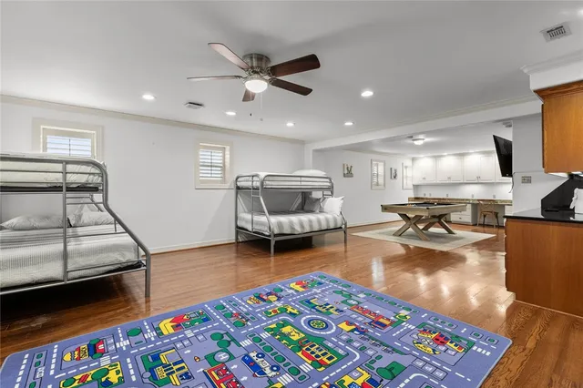 a living room with furniture and a rug