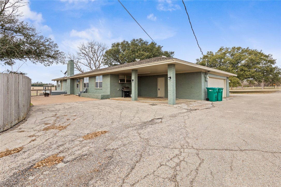 2275 West Moonlight Drive Robinson, TX 76706 - Photo 28 of 40 a front view of a house with a yard and potted plants