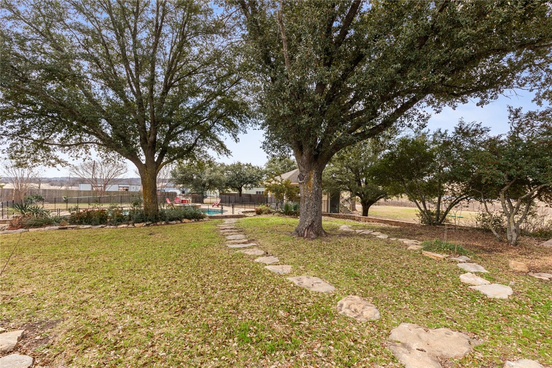 2275 West Moonlight Drive Robinson, TX 76706 - Photo 29 of 40 a view of swimming pool with trees