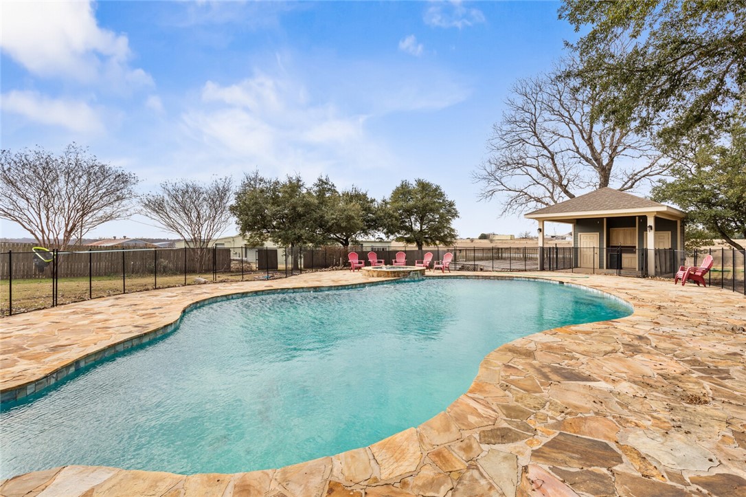 2275 West Moonlight Drive Robinson, TX 76706 - Photo 31 of 40 a view of swimming pool with a yard