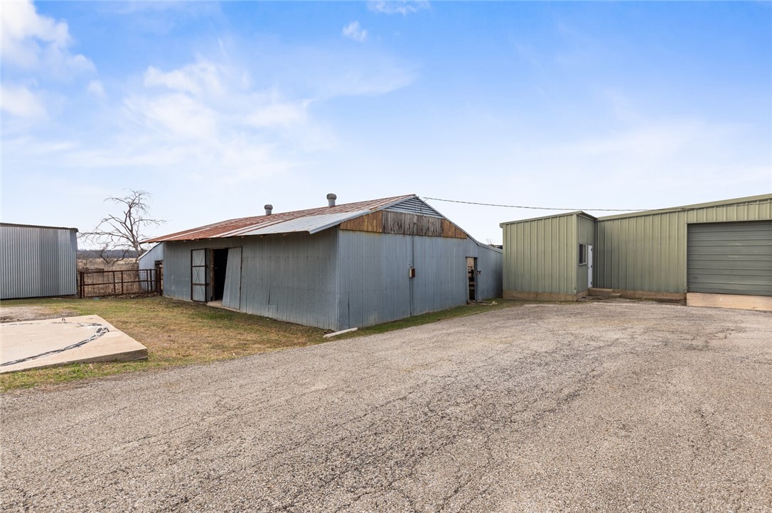 2275 West Moonlight Drive Robinson, TX 76706 - Photo 34 of 40 a view of a house with basketball court