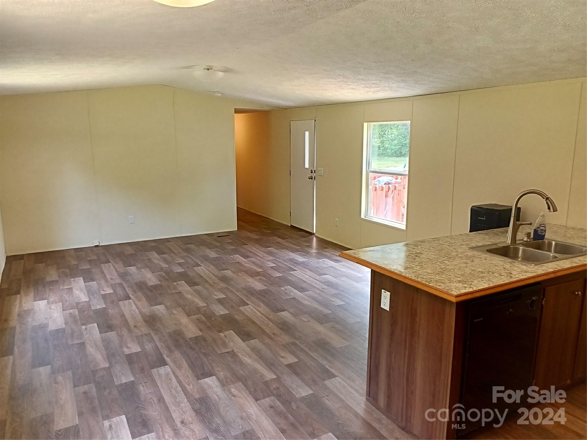 850 Butler Lake Road Chester, SC 29706 - Photo 14 of 20 a kitchen with a sink and a mirror