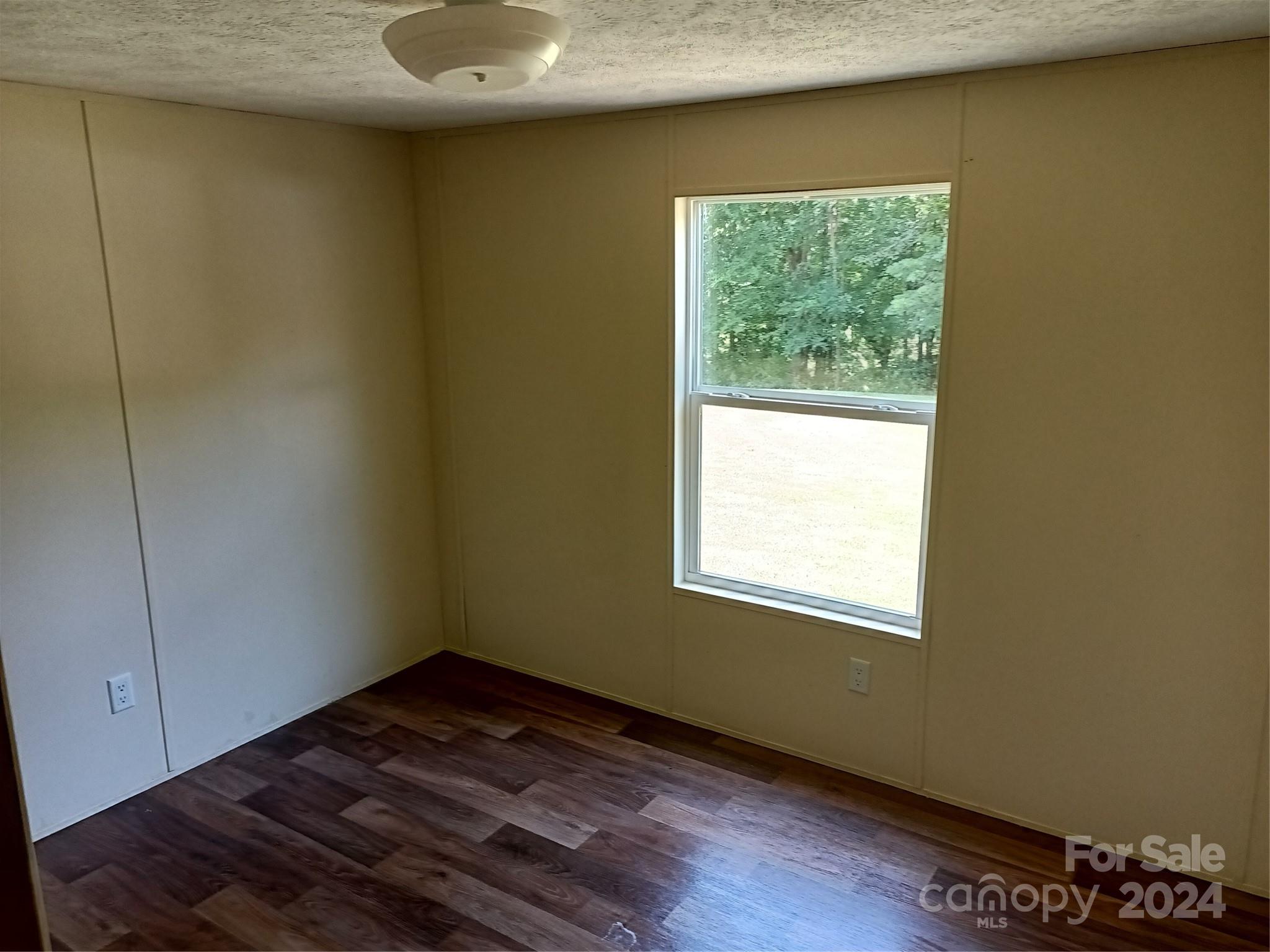 850 Butler Lake Road Chester, SC 29706 - Photo 17 of 20 a view of an empty room and window