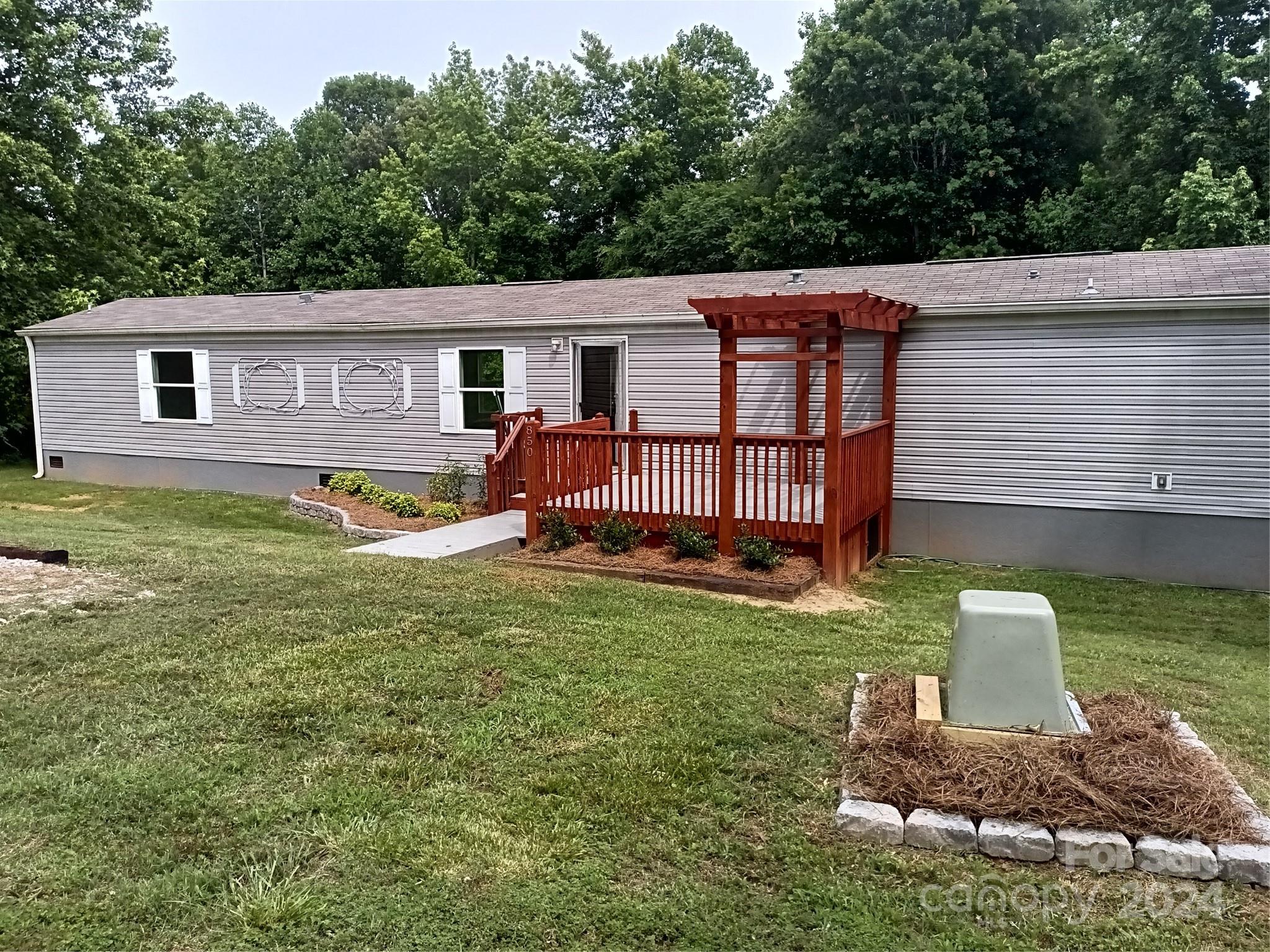 850 Butler Lake Road Chester, SC 29706 - Photo 3 of 20 a view of a backyard with a garden