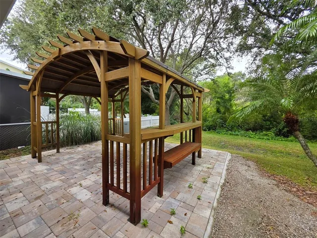 a view of a trees with a yard