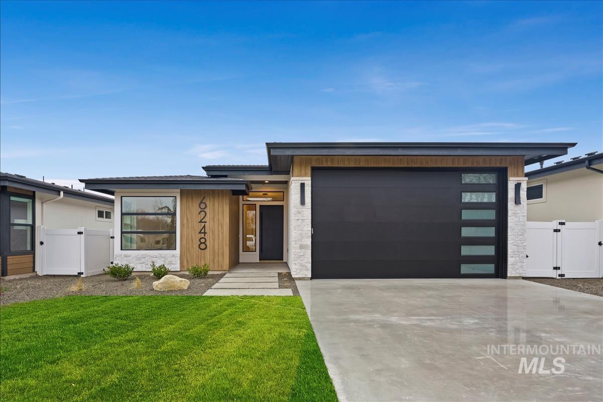 6248 West Elmer Street Boise, ID 83703 - Photo 1 of 40 Contemporary house featuring a gate, driveway, and a garage