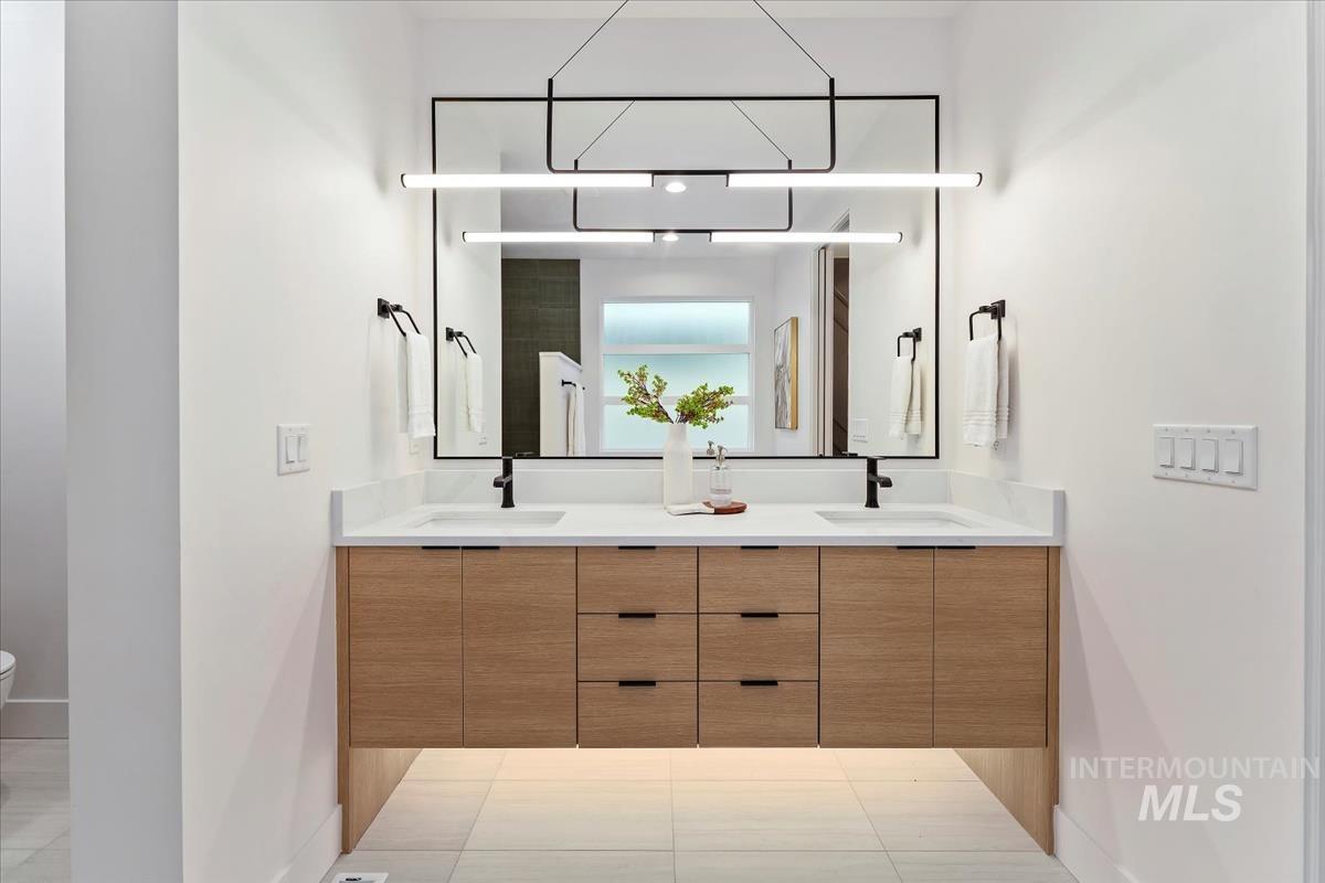 6248 West Elmer Street Boise, ID 83703 - Photo 11 of 40 Bathroom featuring double vanity and toilet