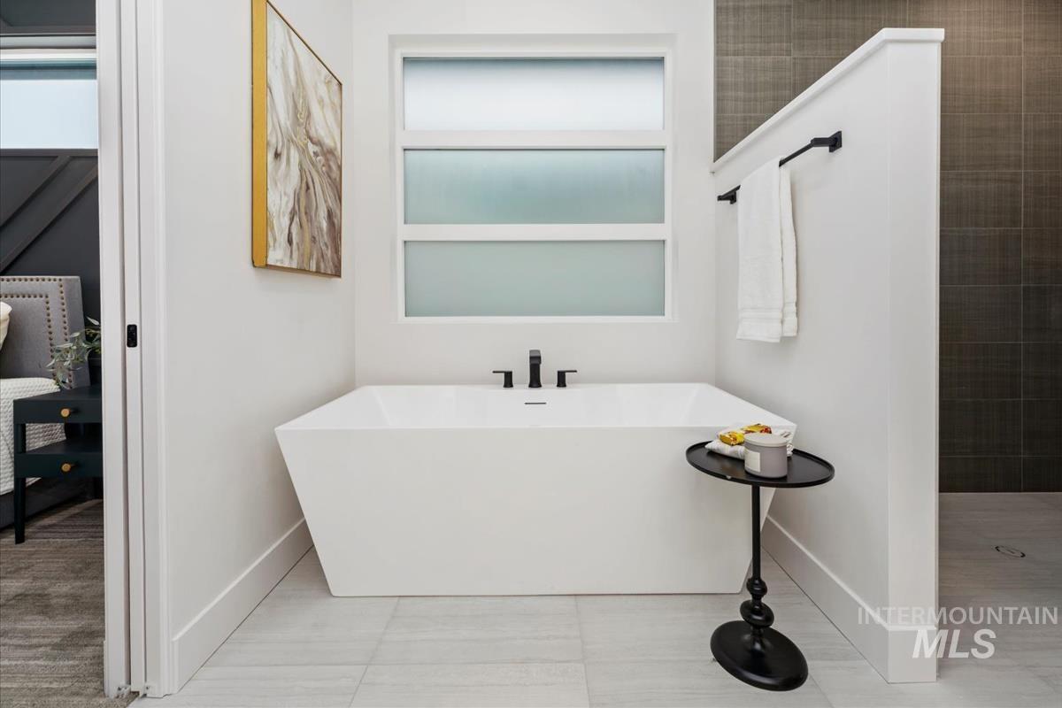 6248 West Elmer Street Boise, ID 83703 - Photo 12 of 40 Bathroom featuring a freestanding bath and walk in shower