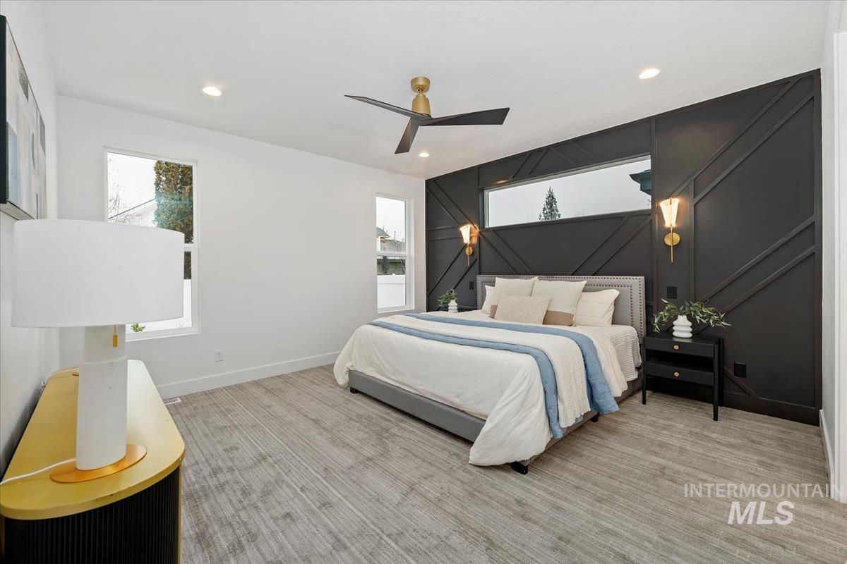 6248 West Elmer Street Boise, ID 83703 - Photo 17 of 40 Bedroom with a ceiling fan, light colored carpet, recessed lighting, and an accent wall