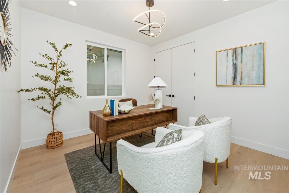 6248 West Elmer Street Boise, ID 83703 - Photo 18 of 40 Home office featuring light wood-style flooring, a chandelier, and recessed lighting