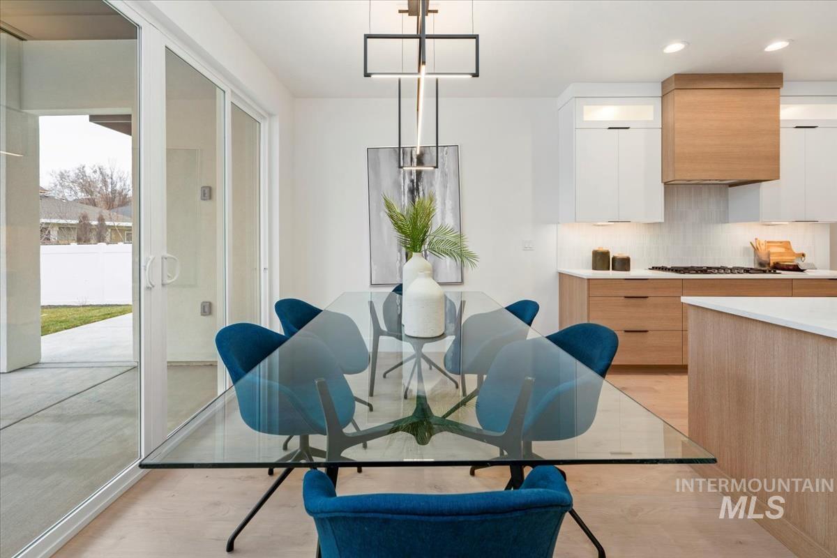 6248 West Elmer Street Boise, ID 83703 - Photo 27 of 40 Dining space with light wood-style floors and recessed lighting