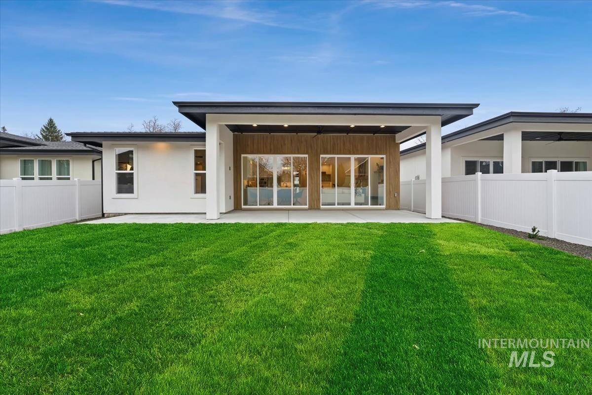 6248 West Elmer Street Boise, ID 83703 - Photo 37 of 40 Rear view of property featuring a patio area, a fenced backyard, stucco siding, and ceiling fan