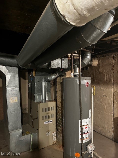 362 Howe Street Akron, OH 44307 - Photo 20 of 23 Utilities with water heater and heating unit
