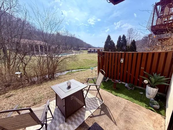 a view of a chairs and table on the terrace