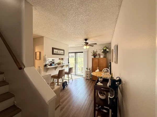 a view of a living room and dining room