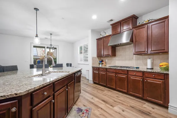 a view of a storage and utility room with washer and dryer