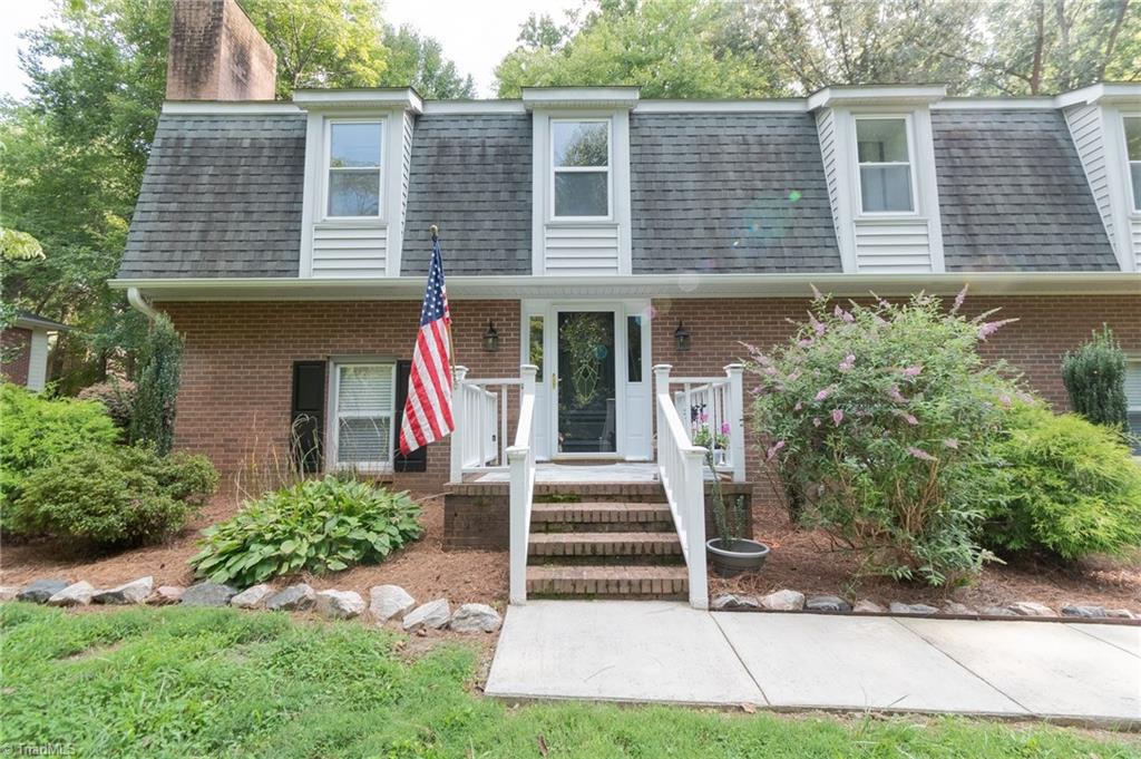 5808 Oakside Road Winston-Salem, NC 27104 - Photo 1 of 29 This isn't your mom's split-foyer! Bright and open in a beautiful mature neighborhood with great landscaping and end-of-street privacy