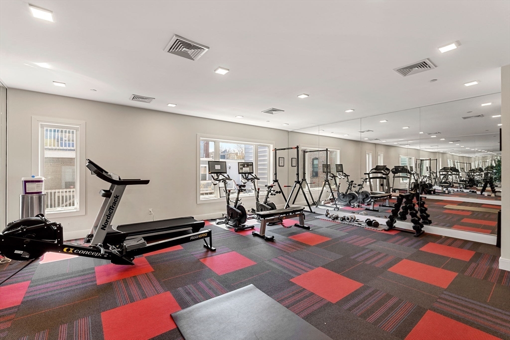 287 Maverick Street, Unit 201 Boston, MA 02128 - Photo 15 of 17 a view of a room with gym equipment