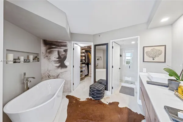 a living room with furniture and a rug