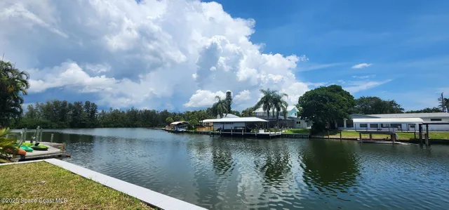 a view of a lake with boats in it