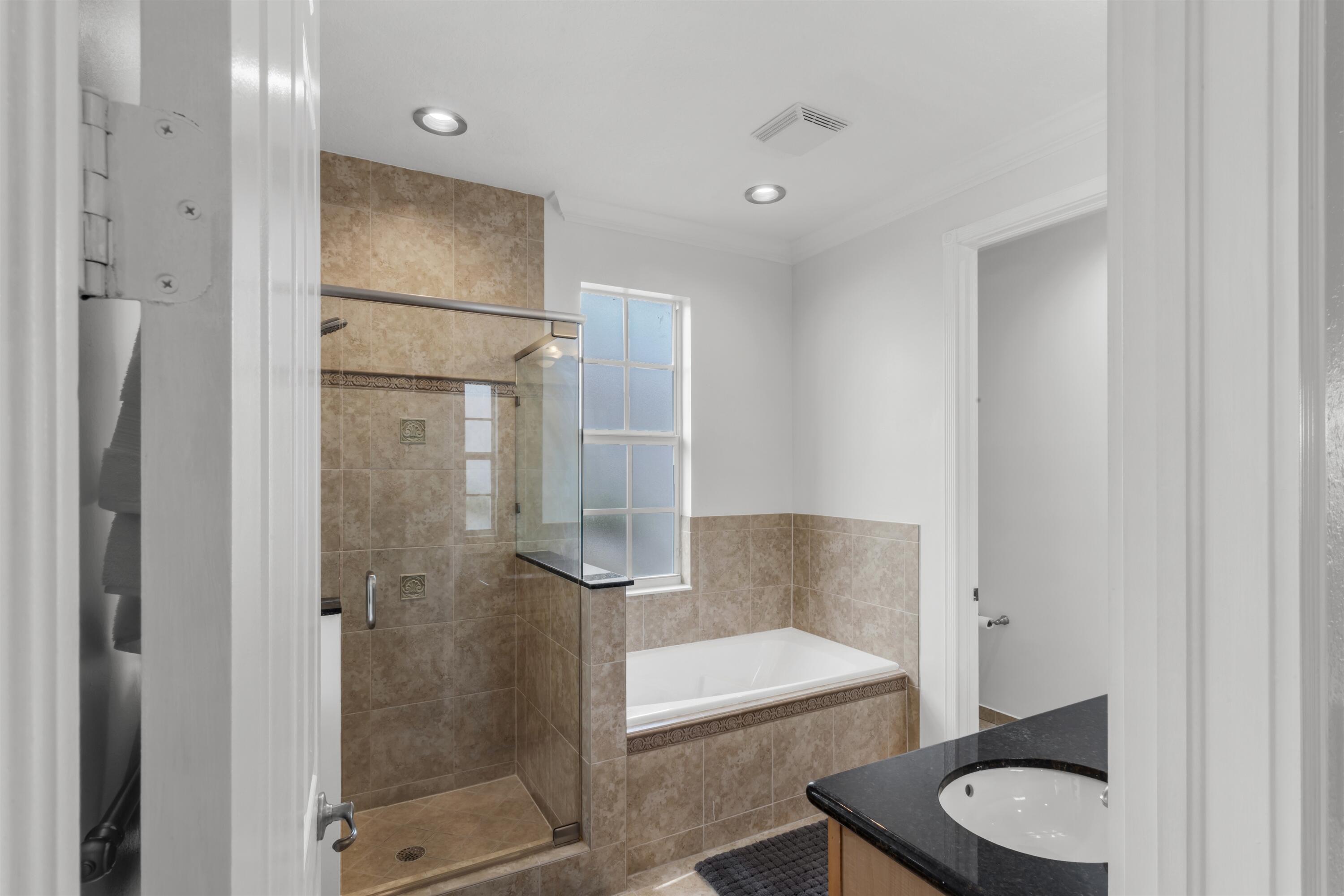 8300 Northwest 9th Avenue Boca Raton, FL 33487 - Photo 16 of 23 PRIMARY_BATHROOM_ANGLE_IN
