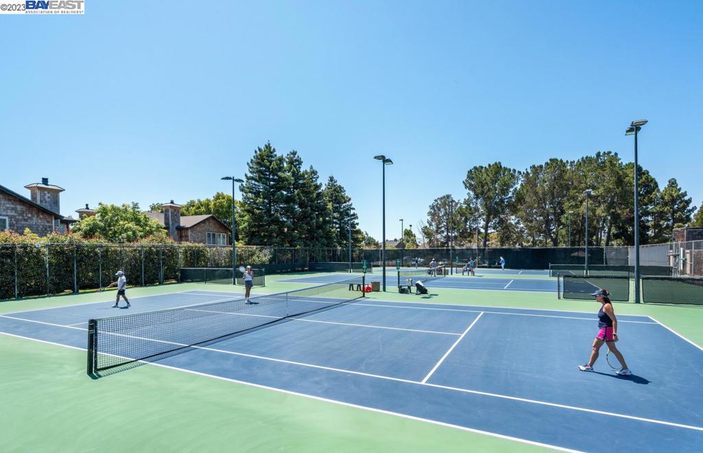 200 Packet Landing Road Alameda, CA 94502 - Photo 21 of 32 a view of a tennis ground with large trees