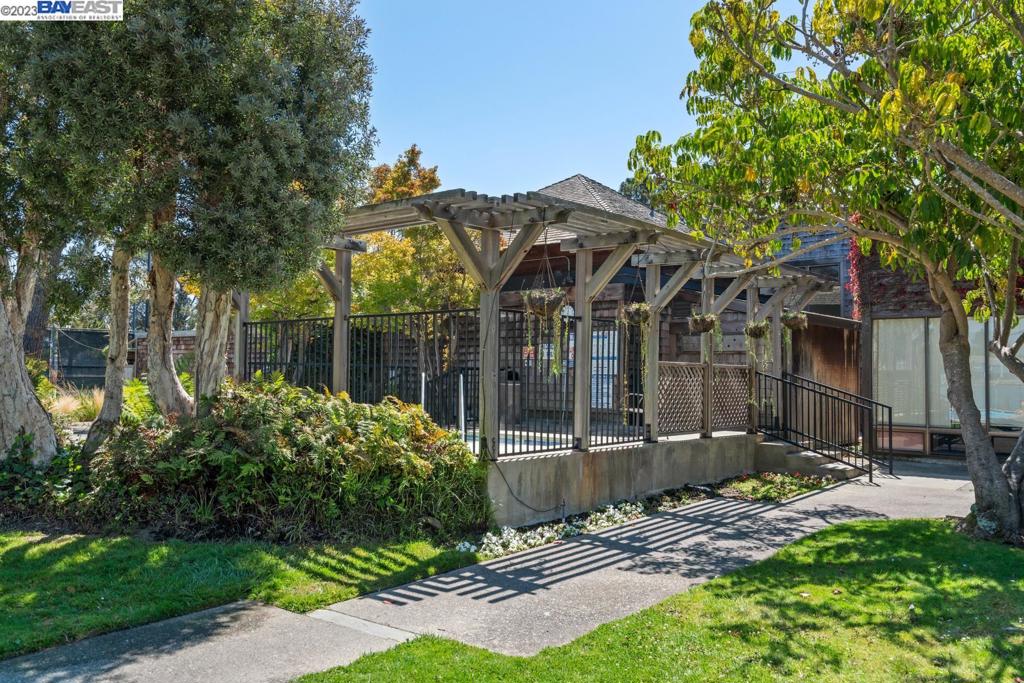 200 Packet Landing Road Alameda, CA 94502 - Photo 27 of 32 a view of a chair and table in backyard of the house