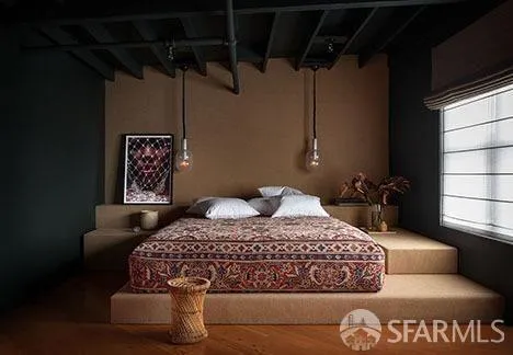 a bedroom with bed and window