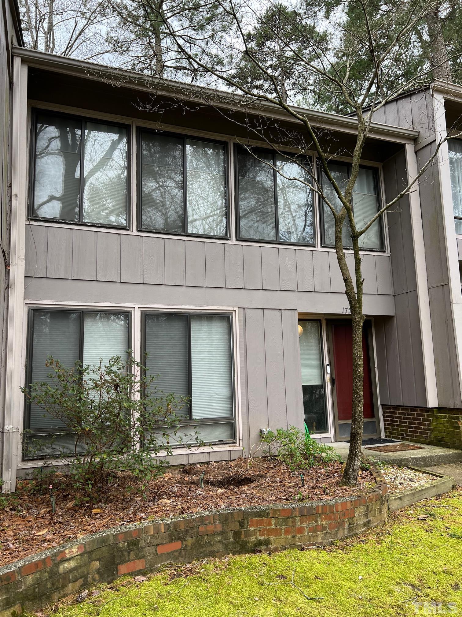 1758 Quail Ridge Road Raleigh, NC 27609 - Photo 2 of 37 a front view of a house with garden