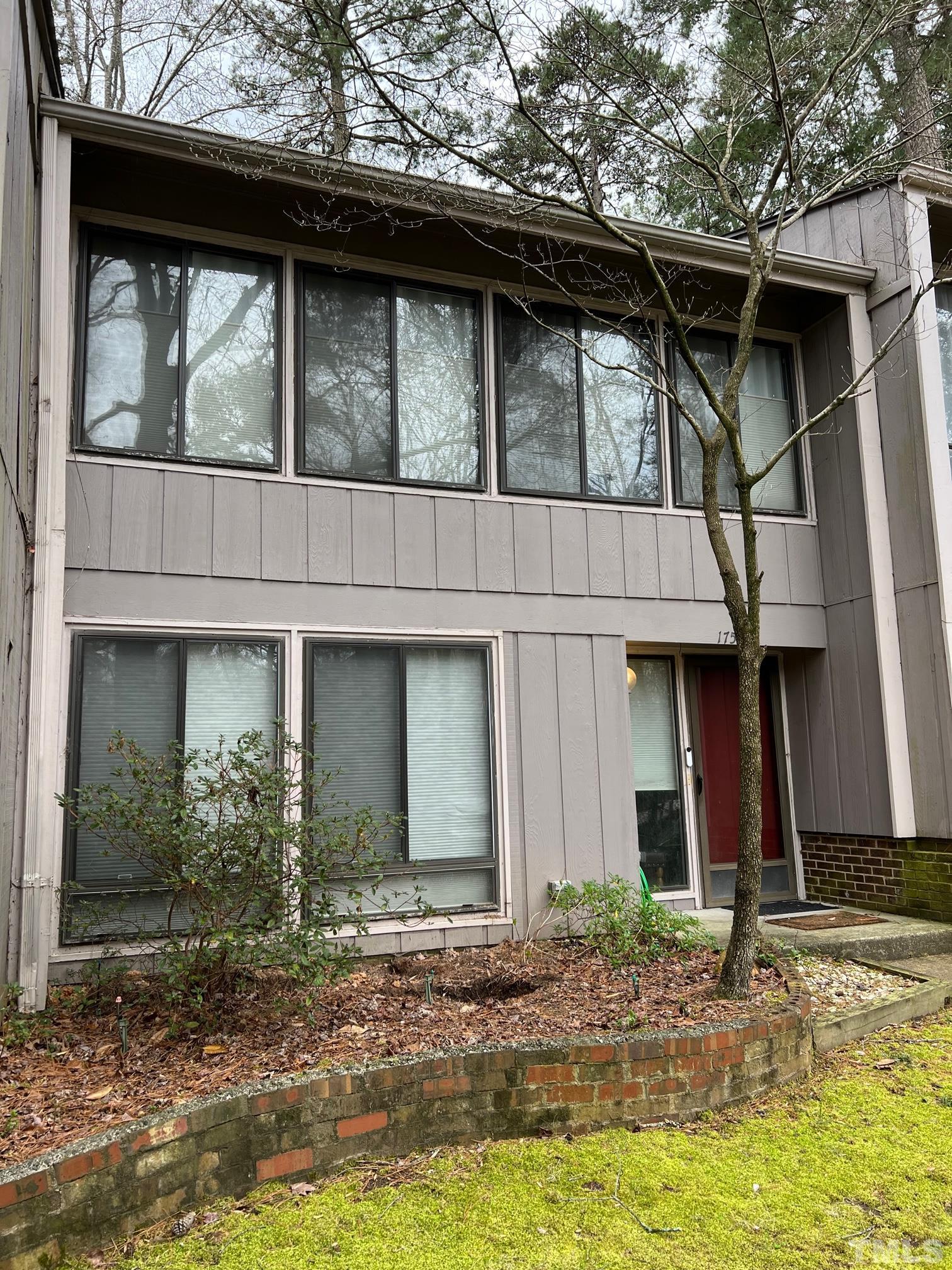 1758 Quail Ridge Road Raleigh, NC 27609 - Photo 3 of 37 a front view of a house with garden