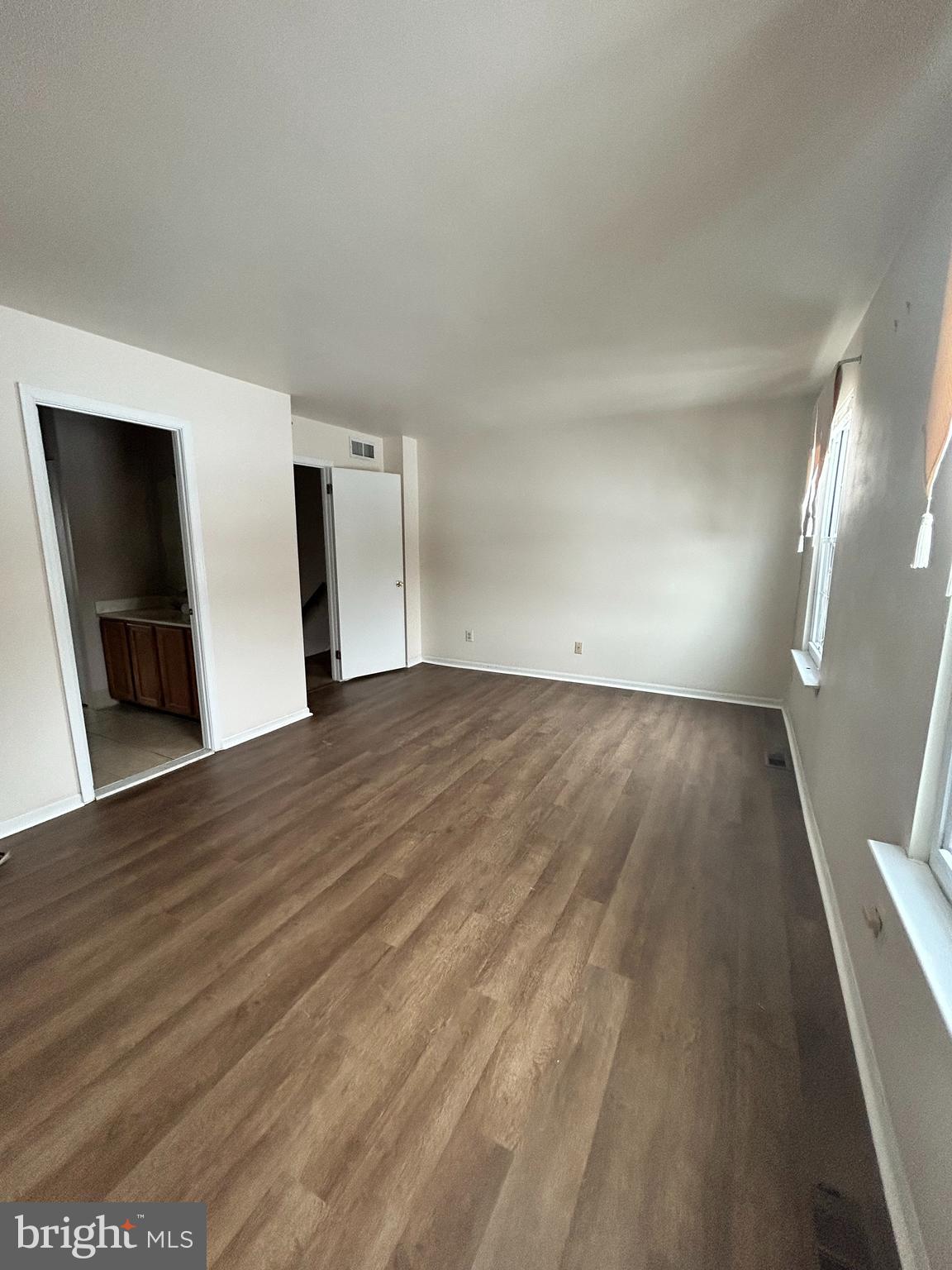 25 Ruth Road Brookhaven, PA 19015 - Photo 12 of 18 a view of empty room with wooden floor