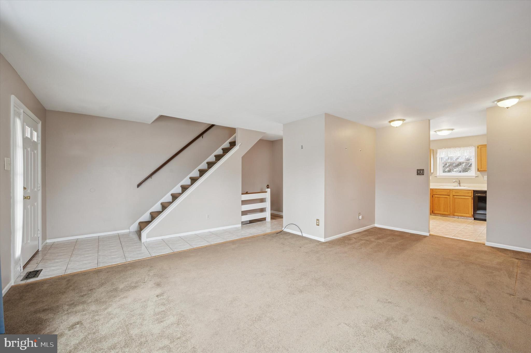 25 Ruth Road Brookhaven, PA 19015 - Photo 4 of 18 a view of an empty room with a window