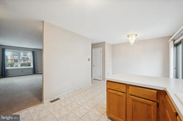 a view of an empty room and window