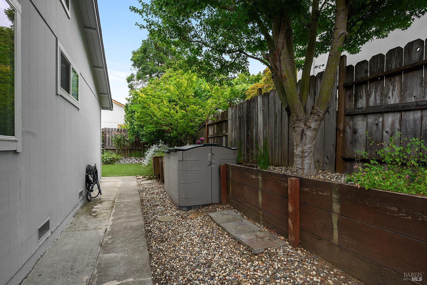 5313 Yerba Buena Road Santa Rosa, CA 95409 - Photo 28 of 34 The spacious side yard provides added separation from neighboring homes while offering additional room for storage.