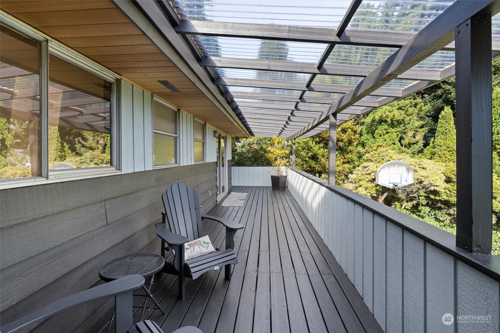 3616 Southwest 112th Street Seattle, WA 98146 - Photo 13 of 40 a view of balcony with wooden floor and outdoor seating