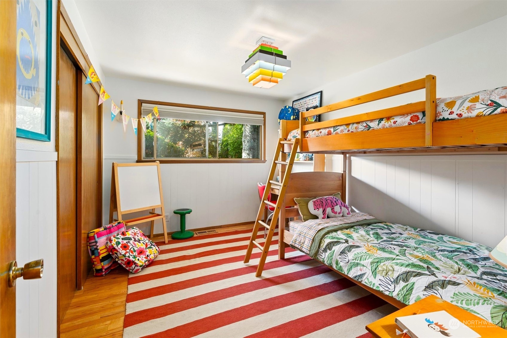 3616 Southwest 112th Street Seattle, WA 98146 - Photo 18 of 40 a bedroom with natural light and rug