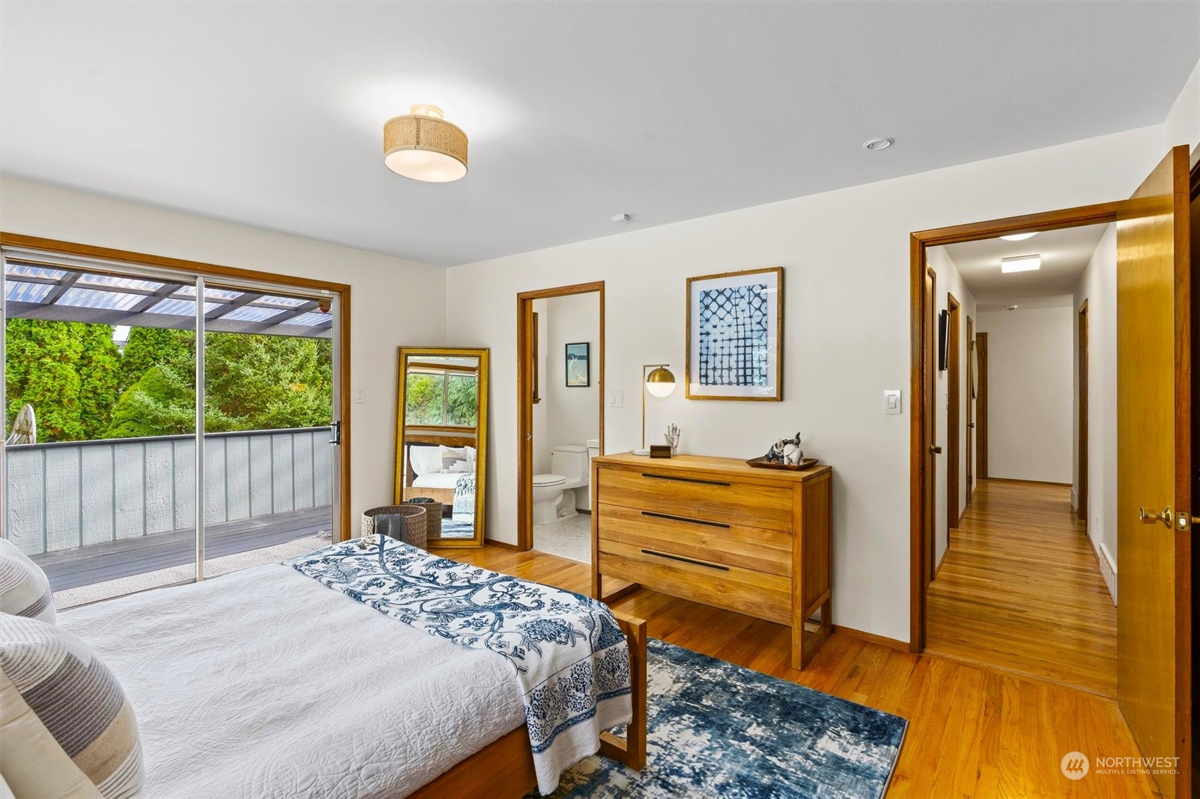3616 Southwest 112th Street Seattle, WA 98146 - Photo 24 of 40 a bedroom with a bed and a dresser next to a window
