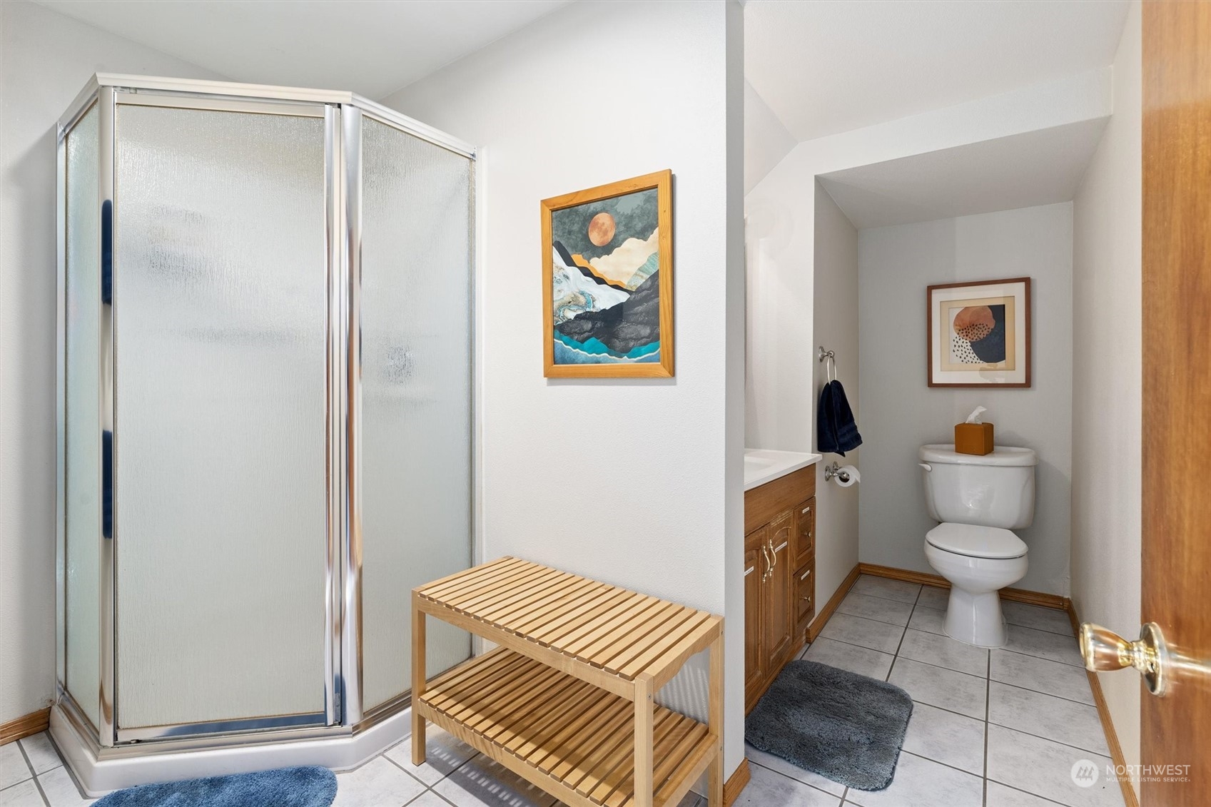 3616 Southwest 112th Street Seattle, WA 98146 - Photo 28 of 40 a bathroom with a toilet a sink and a shower