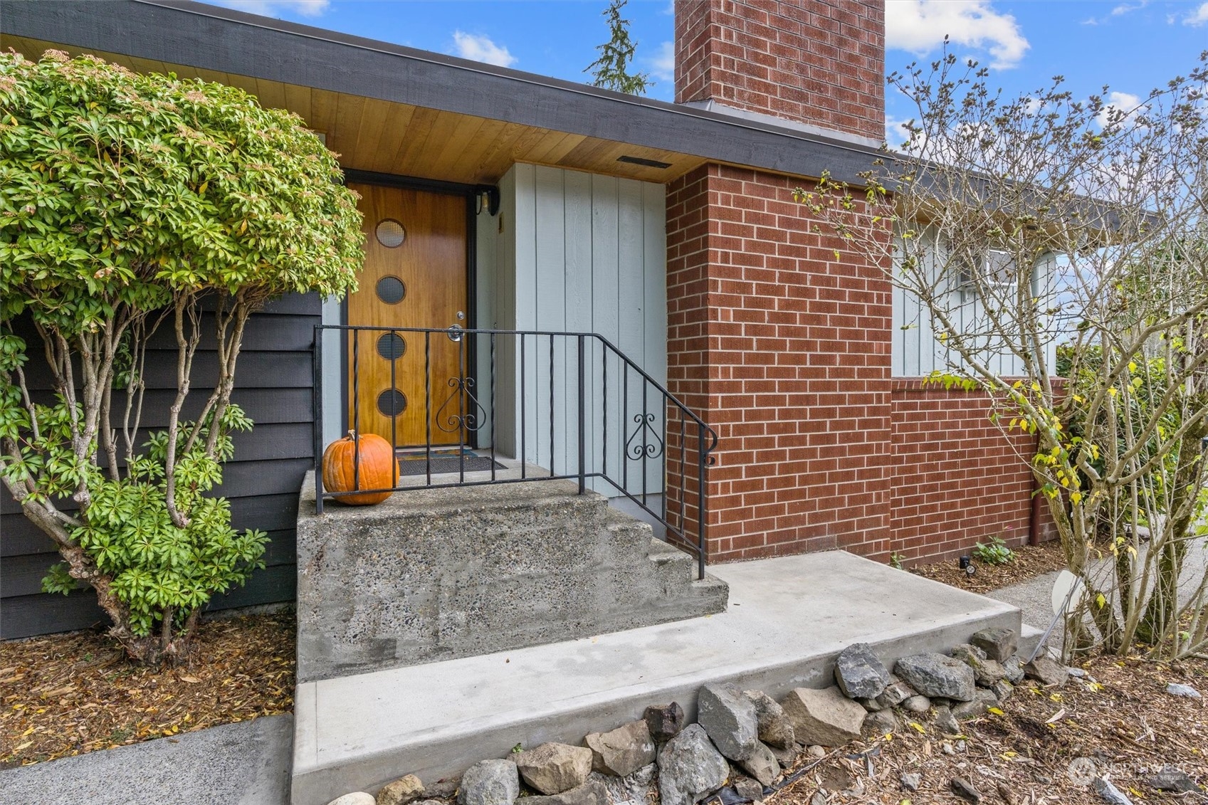 3616 Southwest 112th Street Seattle, WA 98146 - Photo 3 of 40 a view of a house with a backyard