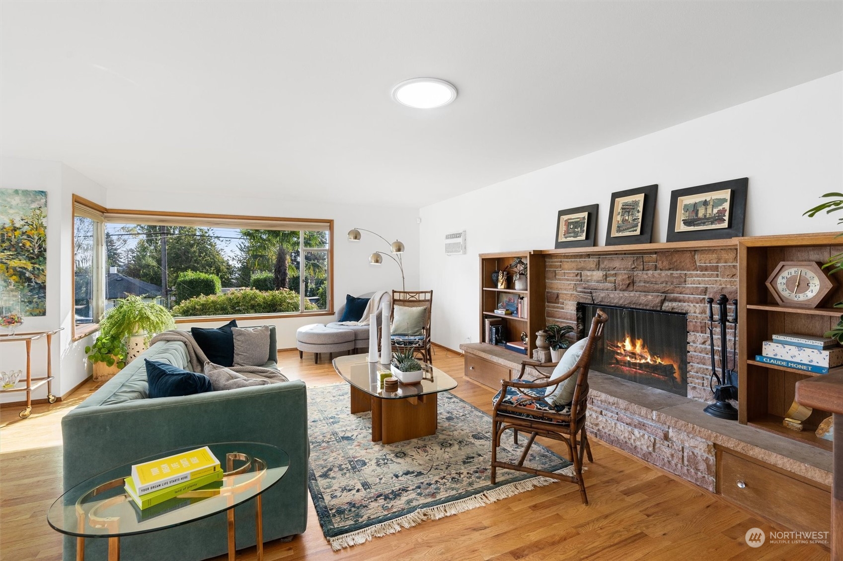 3616 Southwest 112th Street Seattle, WA 98146 - Photo 5 of 40 a living room with fireplace furniture and a large window